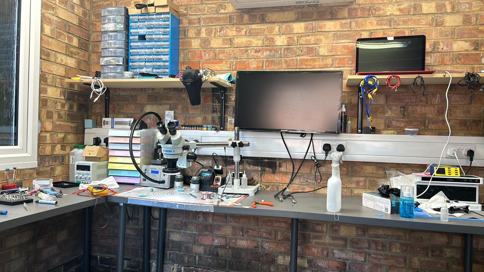 Simons workshop Electronics workbench with microscope and tools